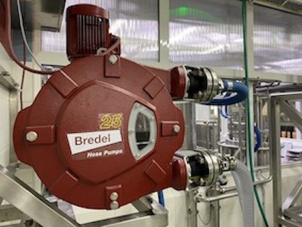 Bredel hose pumps solve problems transferring viscous peach concentrate for SOKO